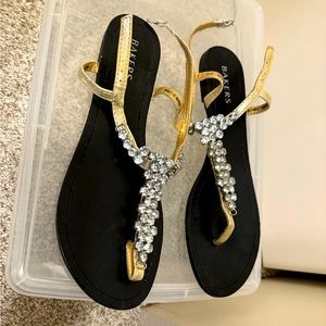 Bakers’ Callista, gold jeweled, T-strap, flat, open toe sandals.